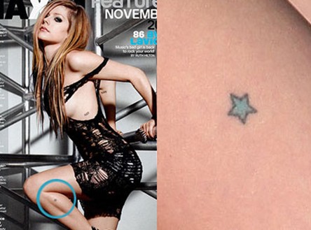Avril-Lavigne-tattoos-–-blue-star-on-leg6