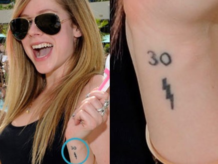 Avril-Lavigne-tattoos-–-‘30’-and-lightning-bolt-tattoos-on-left-wrist8