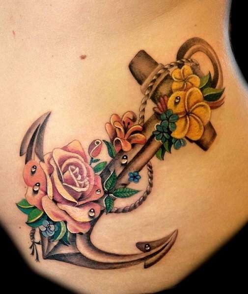 tatuaggio-ancora-grande-fianco-rose_