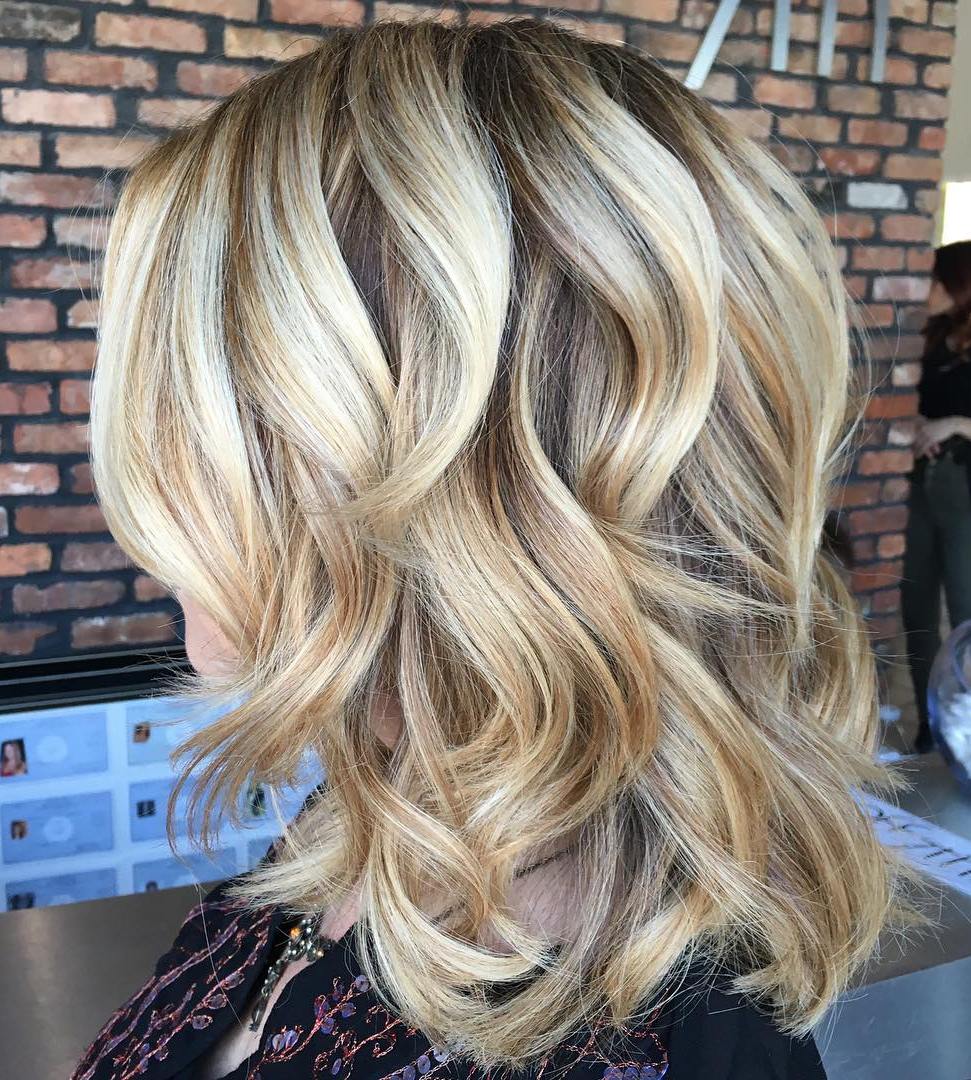 16 medium curly blonde hairstyle CapelliStyle