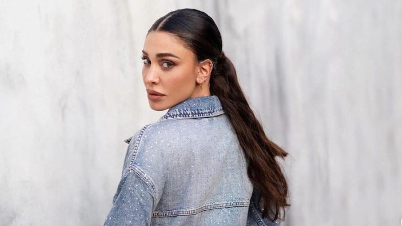 belen con i capelli corti