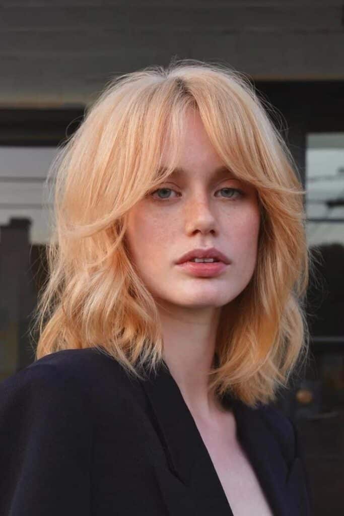 Bardot bangs tendenza capelli 2024