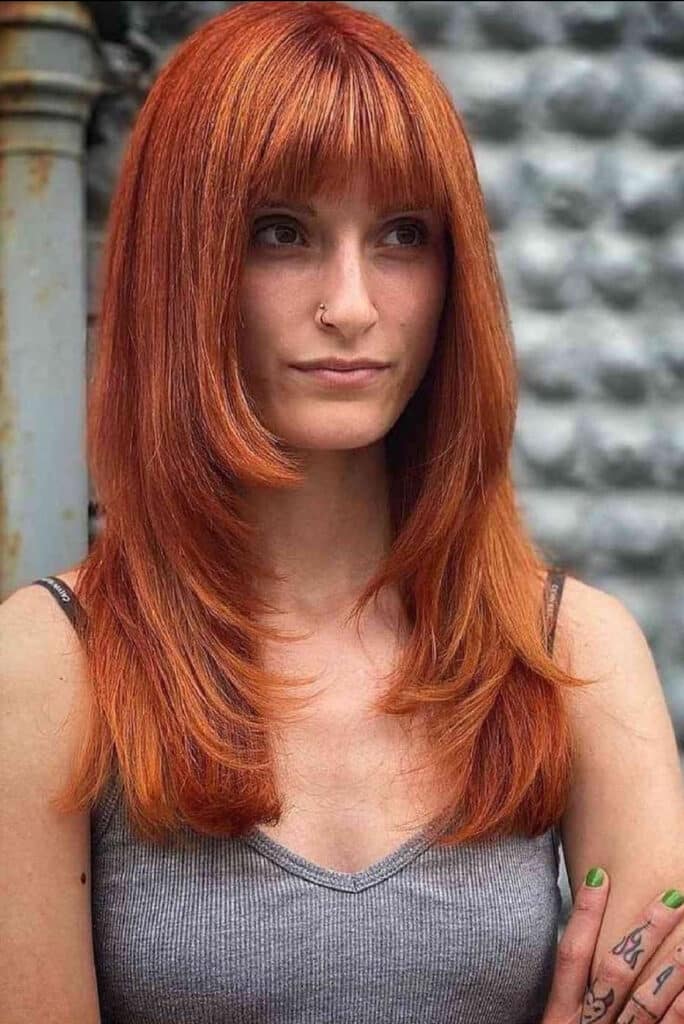 capelli a strati con frangia